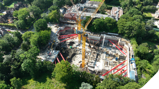 Providing support for apartment block foundation