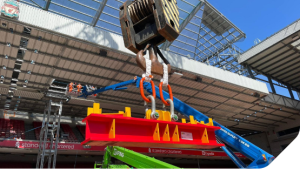 Photograph of our Lifting Beam in use for the roof lift at the Anfield Stadium project